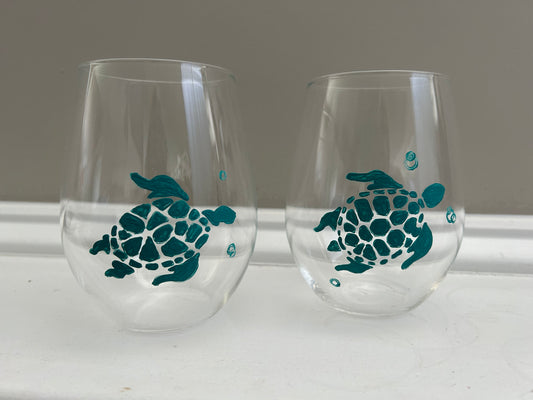 Hand-painted stemless wine glasses painted with teal sea turtles