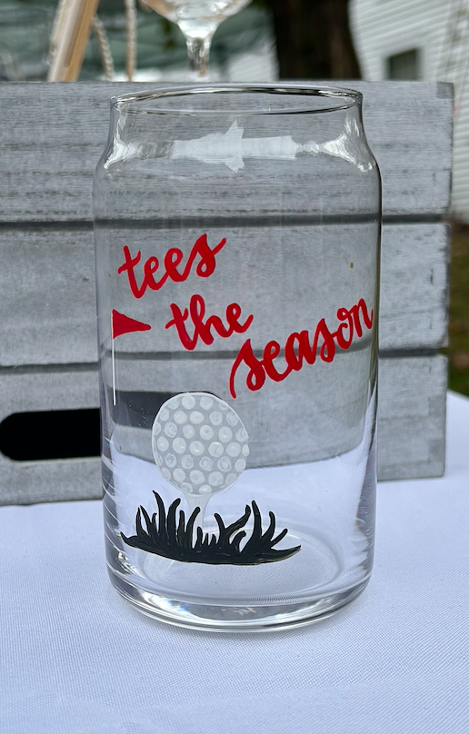 Holiday Themed Golf Beer Glass, Golf Ball & Red Flag painting with "tees the season" written in calligraphy